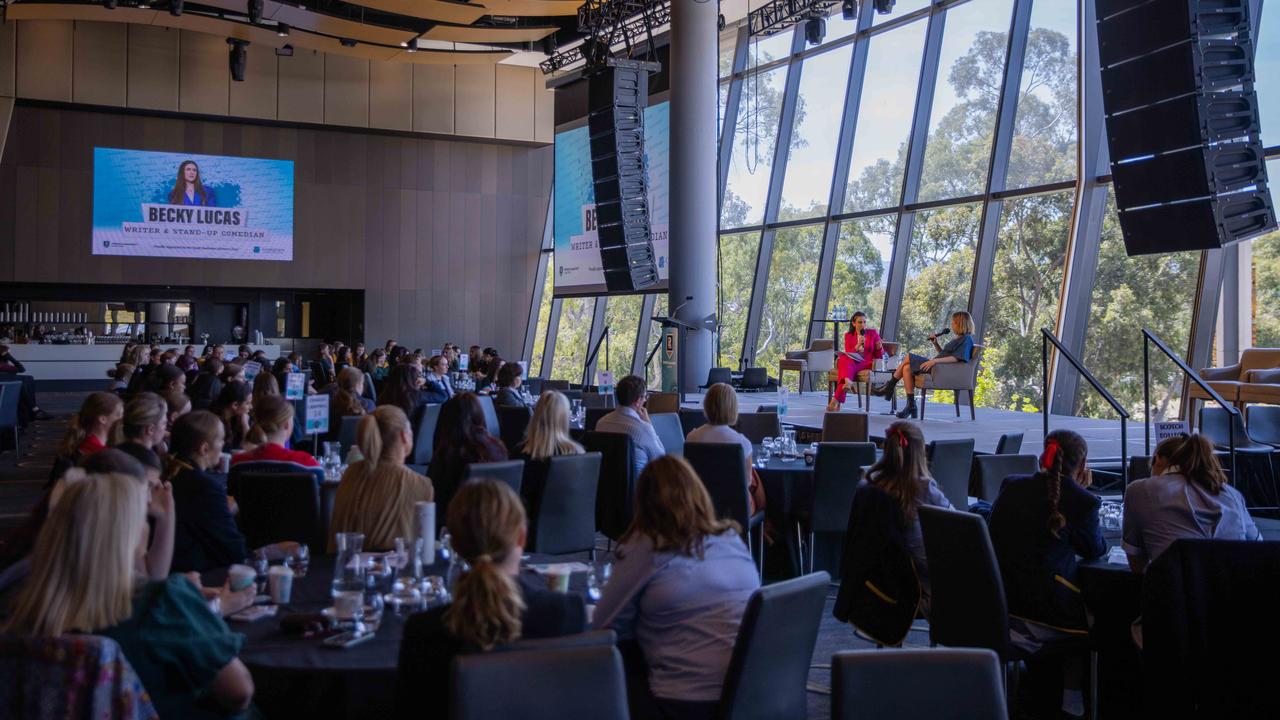 Comedian Becky Lucas sharing her experience with high school students.