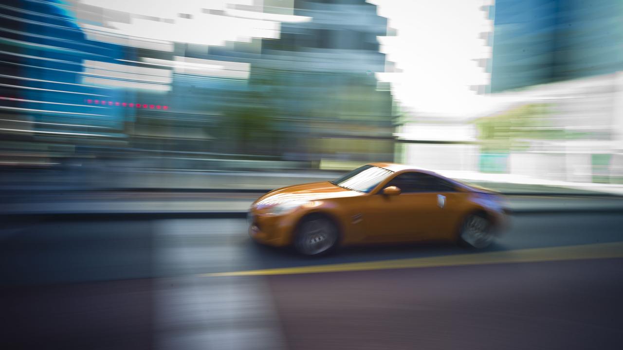Car travels along a street