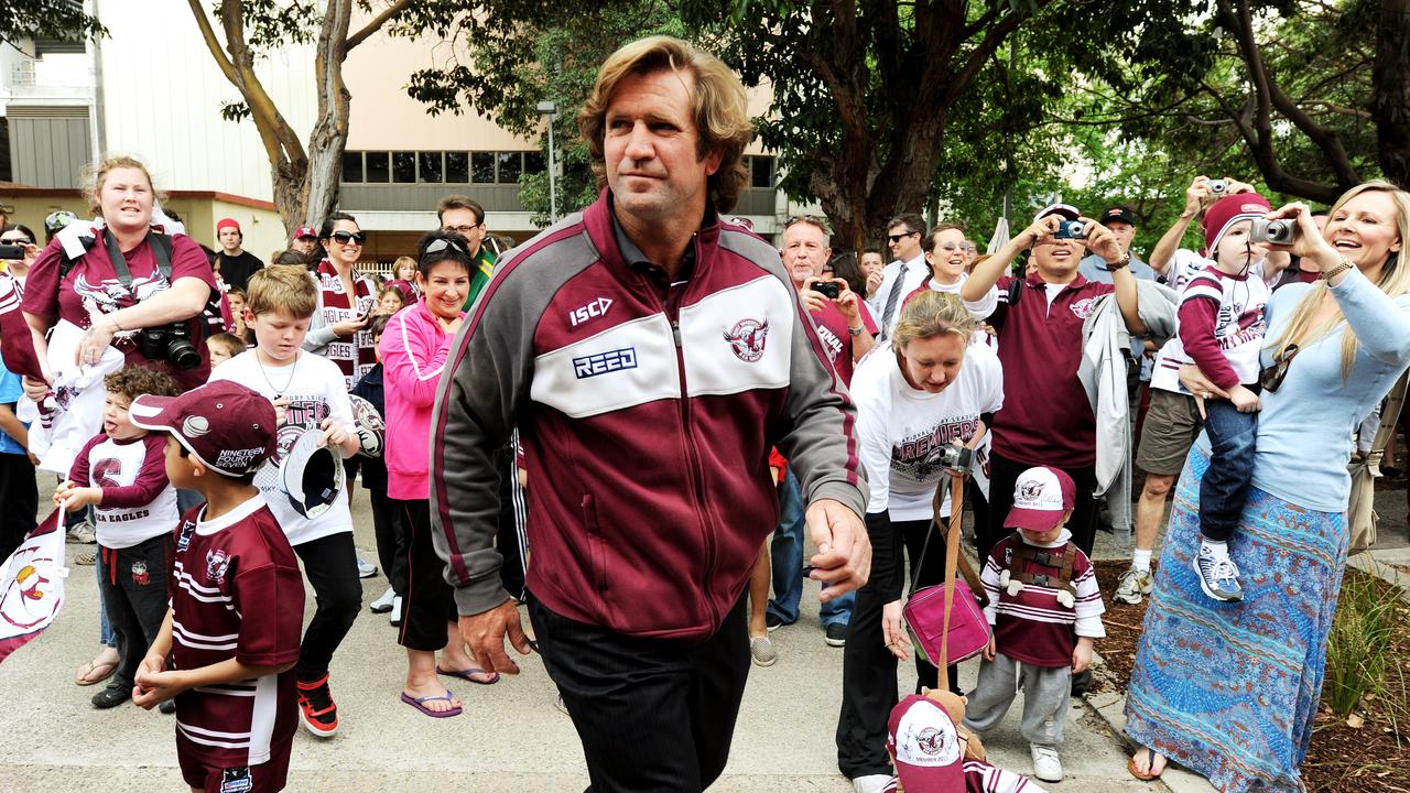 Des Hasler is feted by fans after winning the 2011 premiership