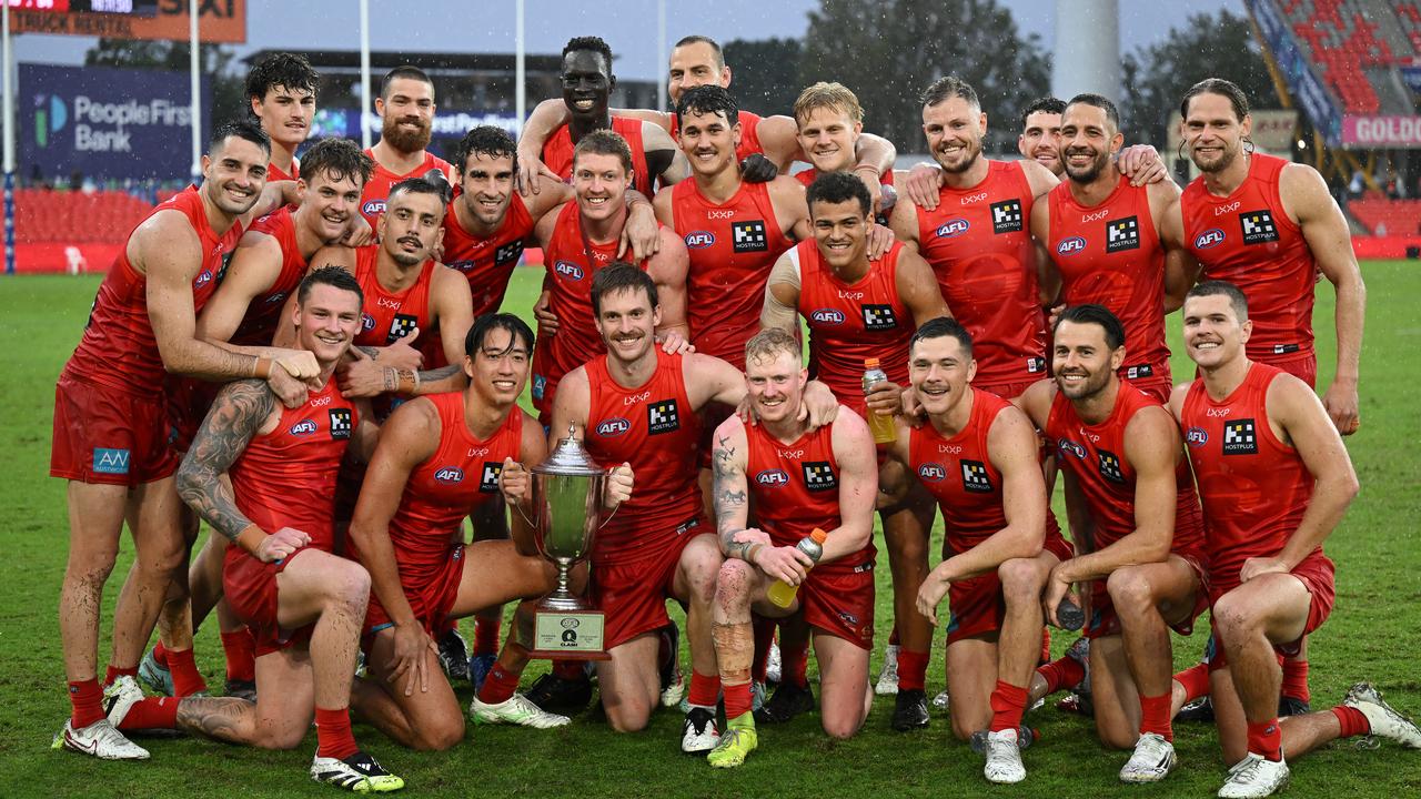 The Suns players took a firm grip on the Q Cup.