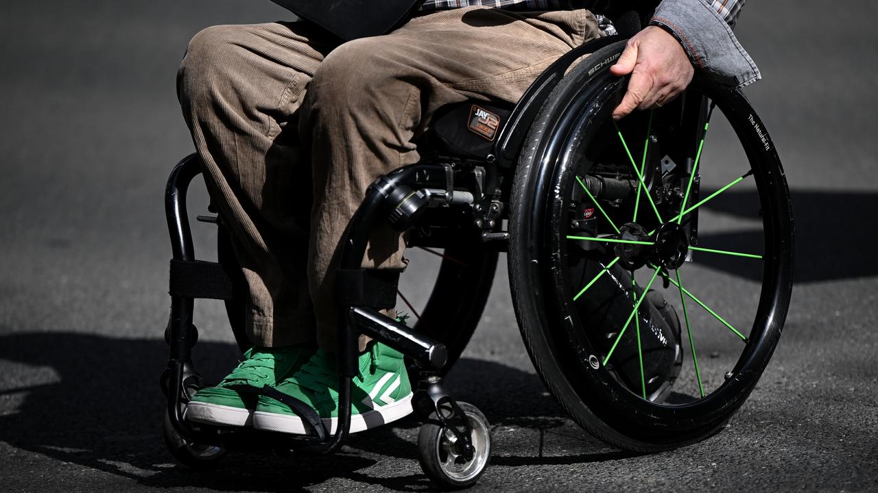 A stock photo of a man in a wheelchair