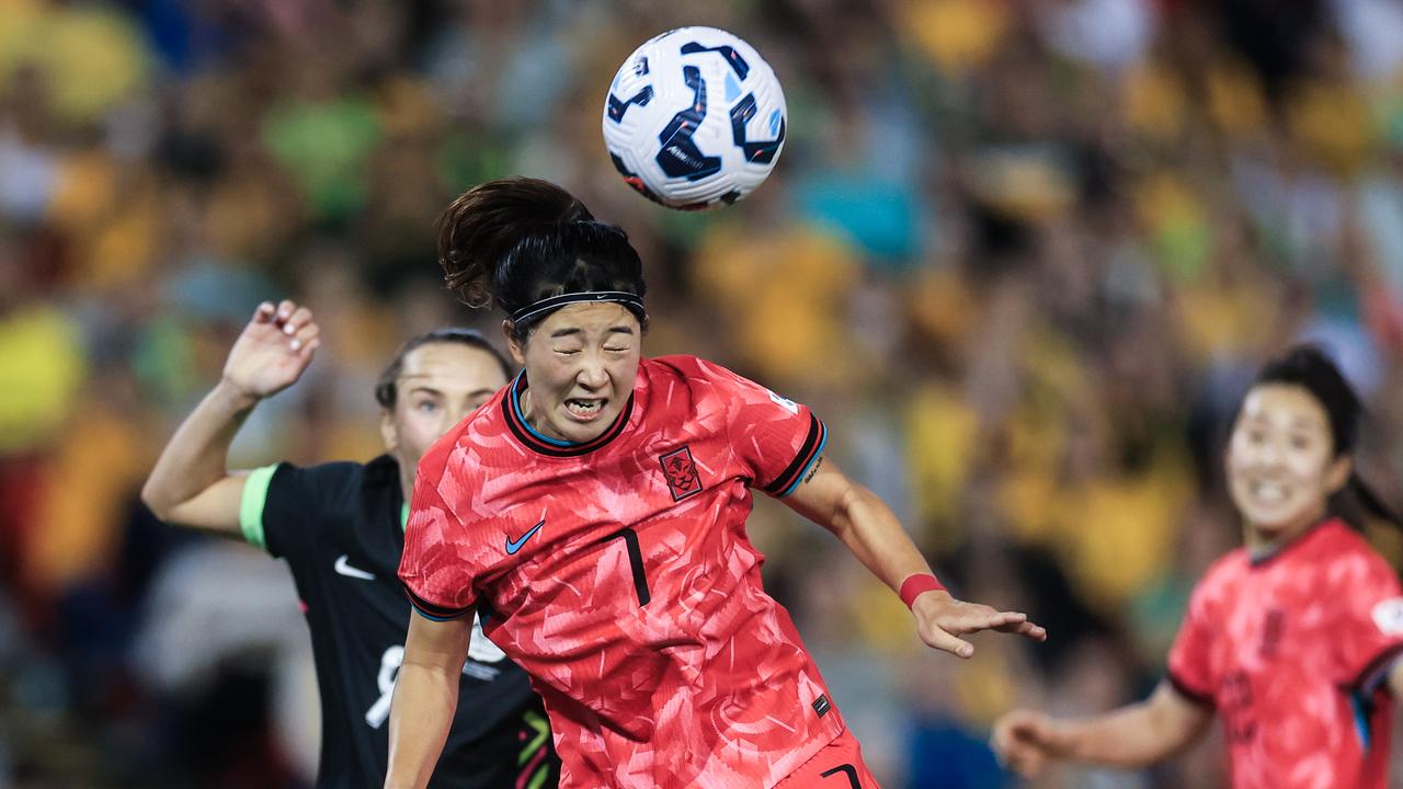 Australia and South Korea action shot.
