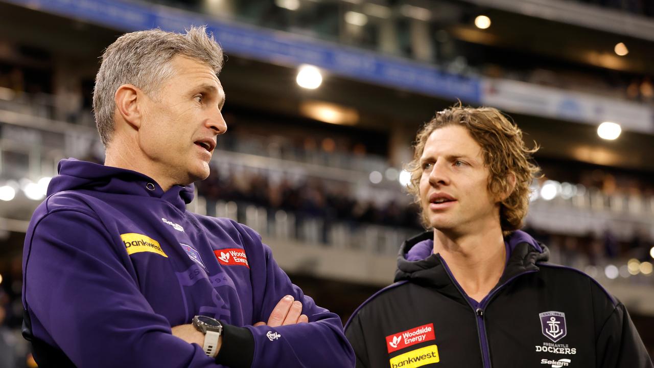 Justin Longmuir and Nat Fyfe.