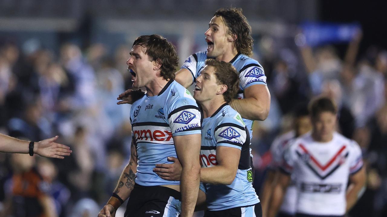 Celebrating Cronulla players.