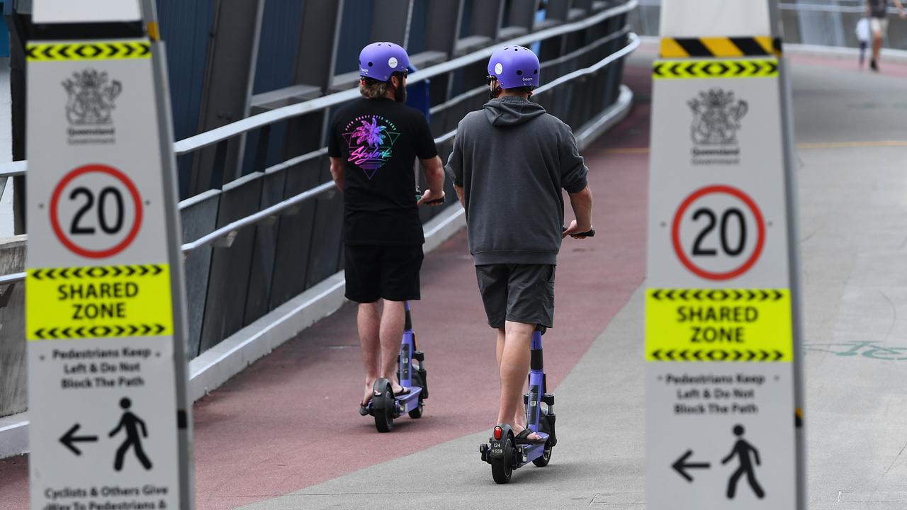 E-scooters are seen being ridden in Brisbane