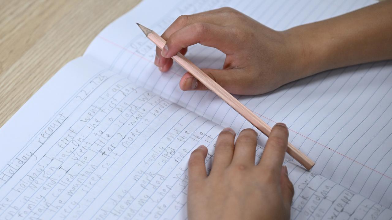 Student at work with pencil and paper