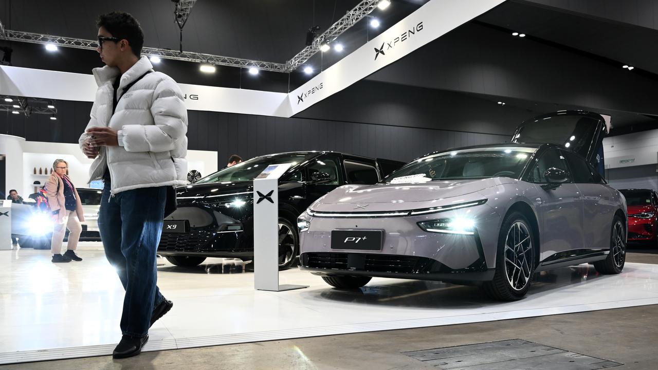 Visitors view XPENG vehicles at Melbourne International EV Autoshow