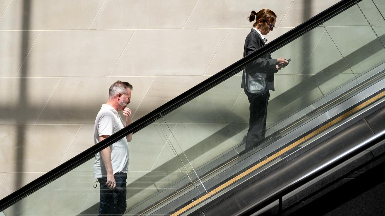 Workers are seen in Sydney,