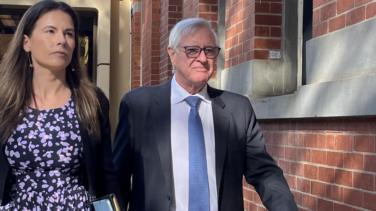 Lawyer Karen Espiner leaves court with Bruce Bellinge