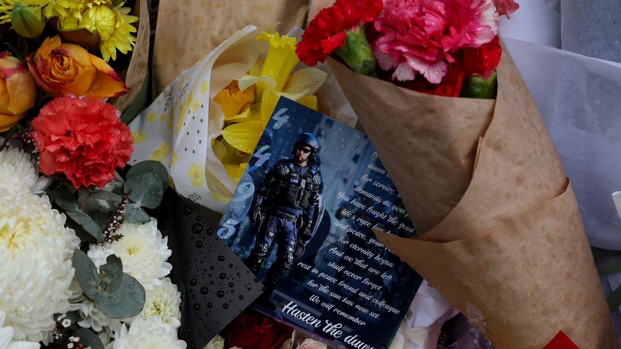 Floral tributes for police officers killed in Porepunkah