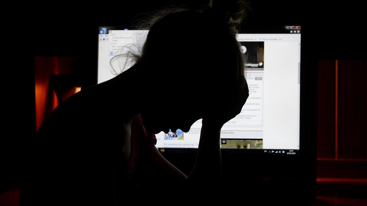 Stocks image of person in front of computer