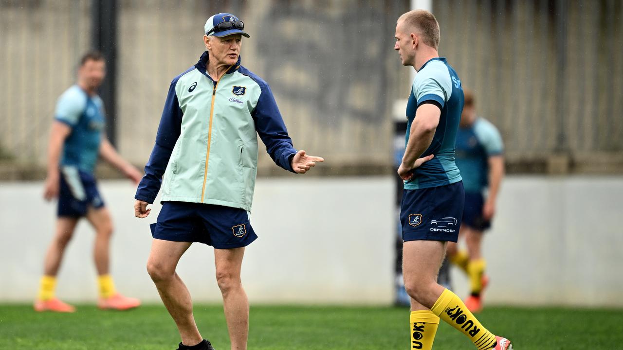 Coach Joe Schmidt speaks with Max Jorgensen.