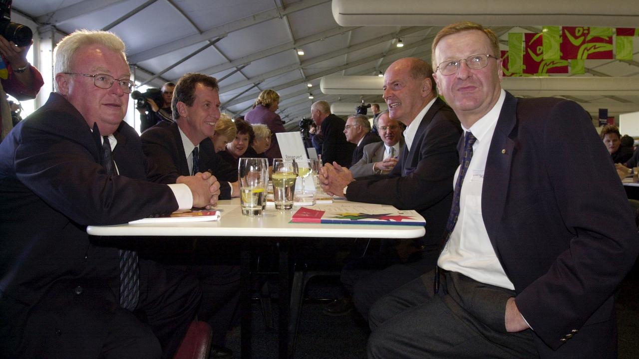 John Coates (right) with dignitaries at the Olympic Village.