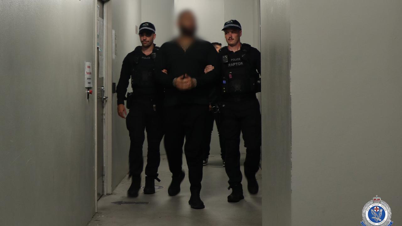 Masood Zakaria being extradited (file)
