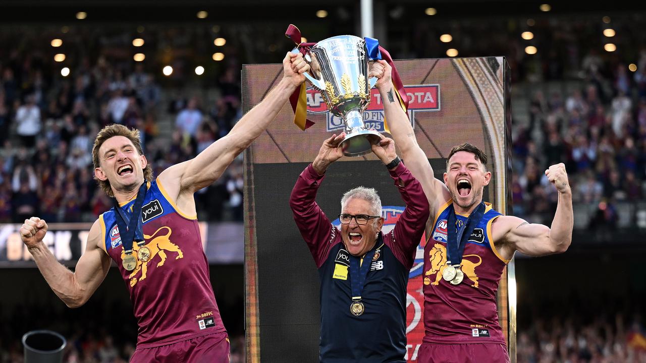Harris Andrews, coach Chris Fagan and Lachie Neale.
