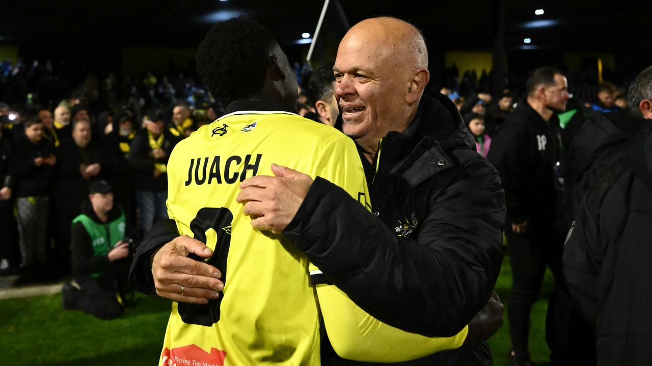 Anastasiadis, seen celebrating with Bul Juach.