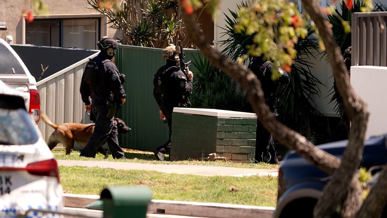 Tactical officers at the property