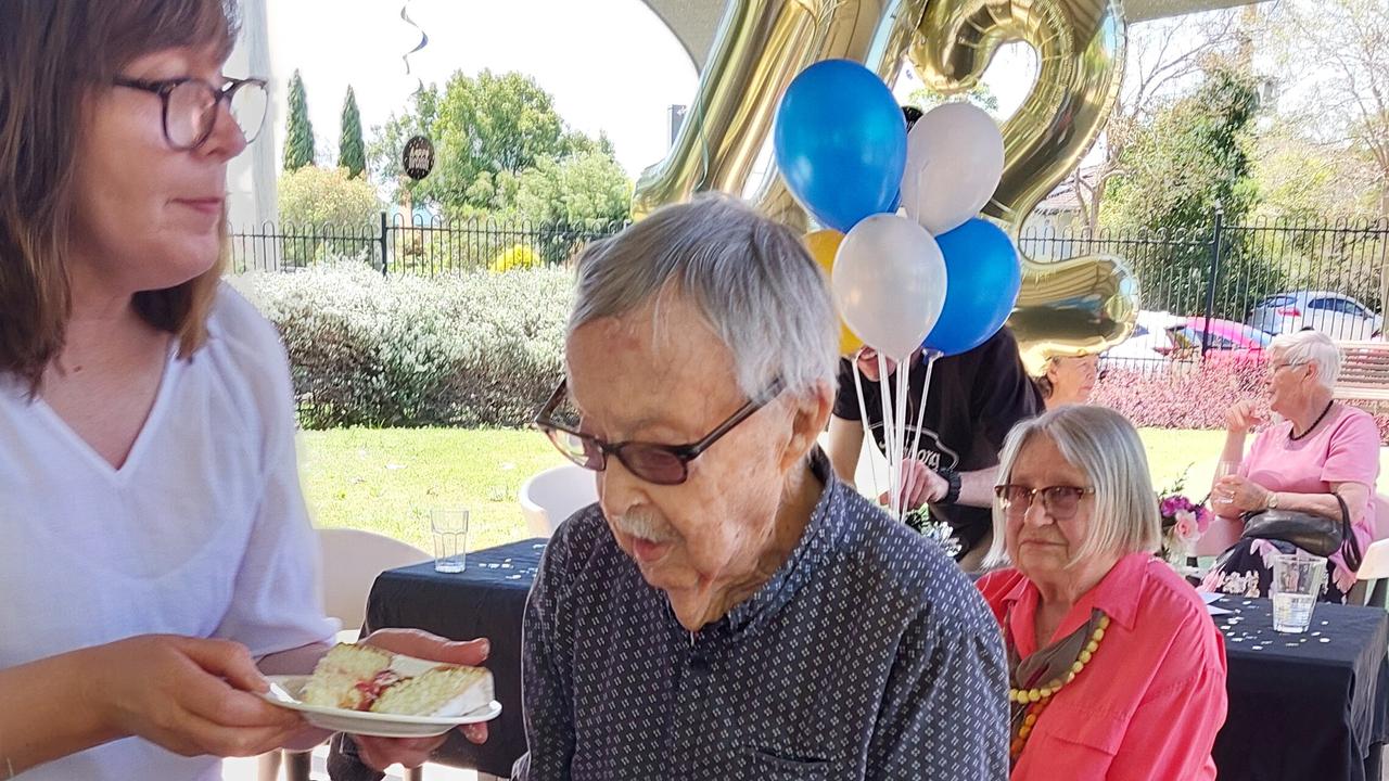 Ken Weeks eating cake