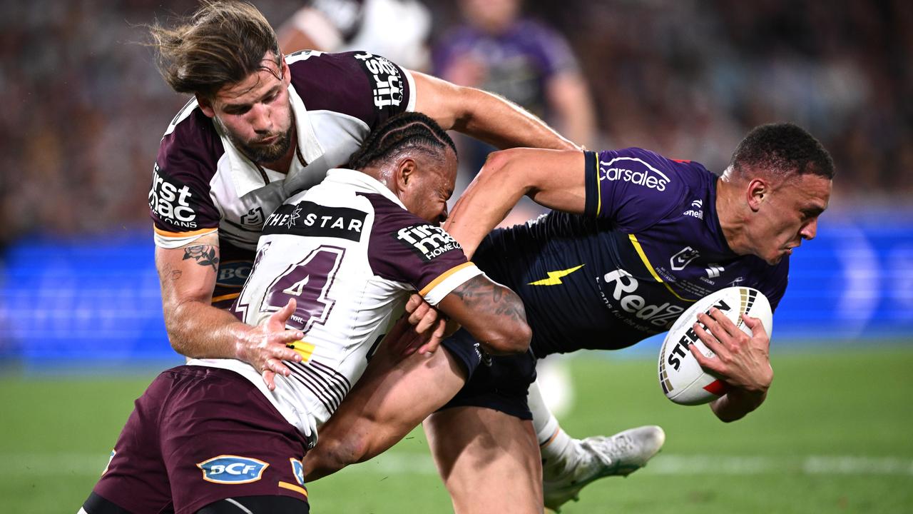 Brisbane's Pat Carrigan and Ezra Mam tackle Will Warbrick.