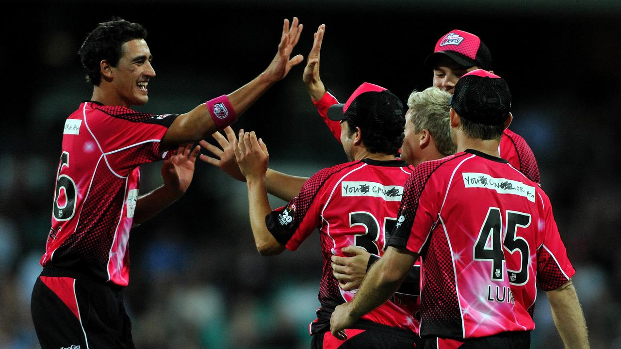 Mitchell Starc (left)