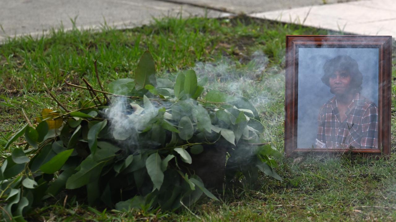 A framed portrait of Mark Haines during a smoking ceremony (file)