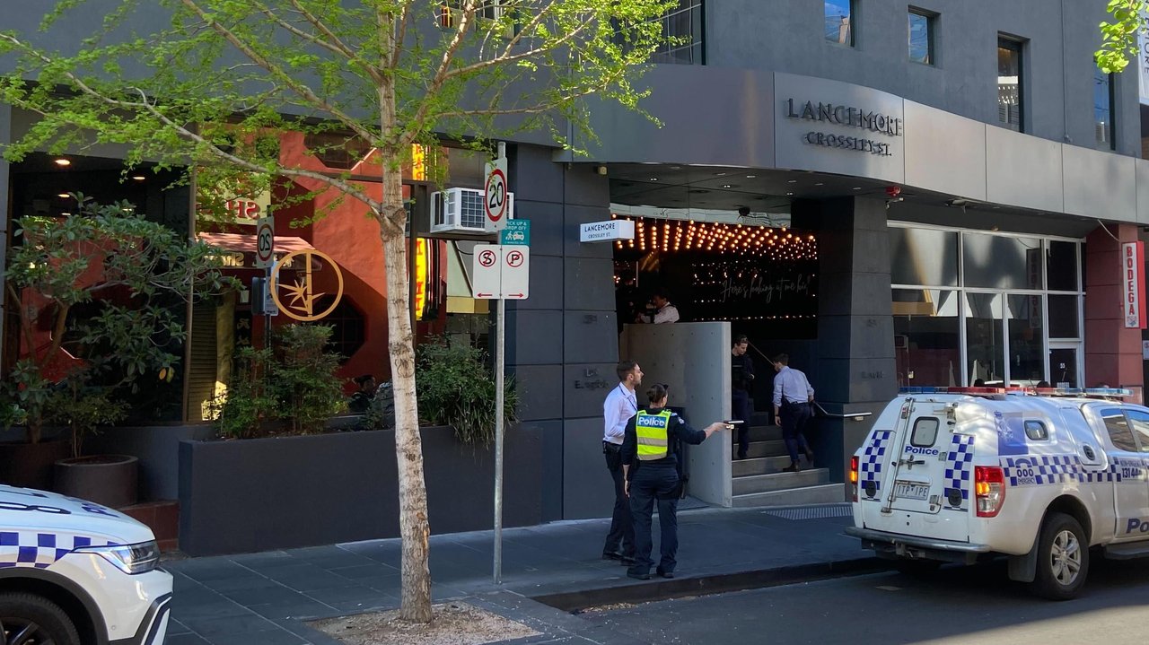 Police near the scene of the arrest of an armed man in Melbourne