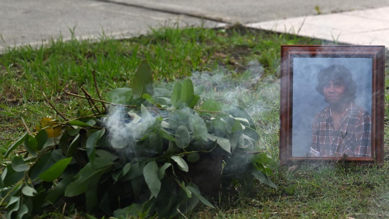 A framed portrait of Mark Haines during a smoking ceremony (file)