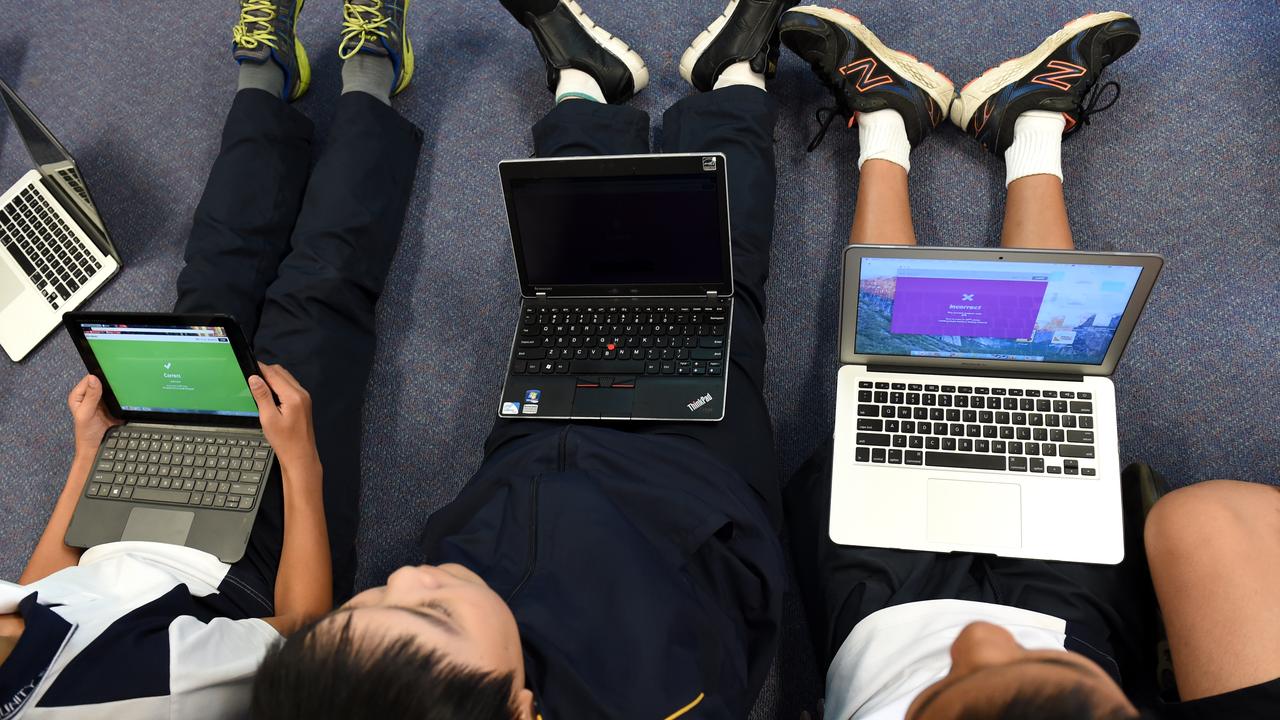 Primary school students on their laptops