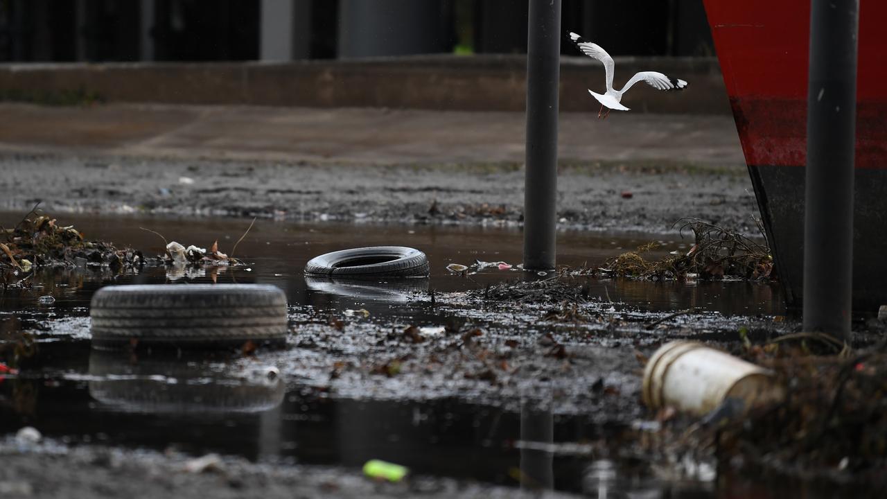 Rubbish is seen in waterway drains