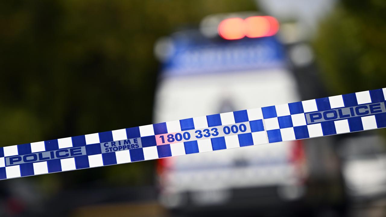 Victoria Police tape and vehicle