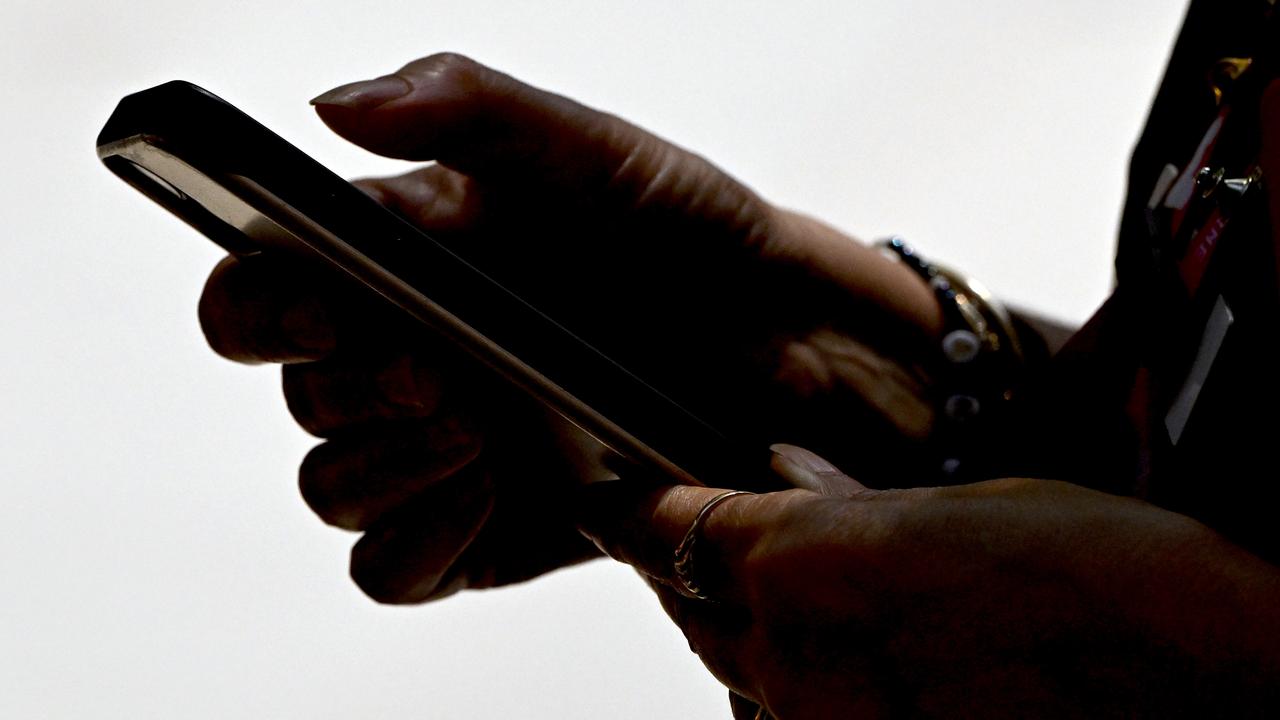 A person using a phone (file image)