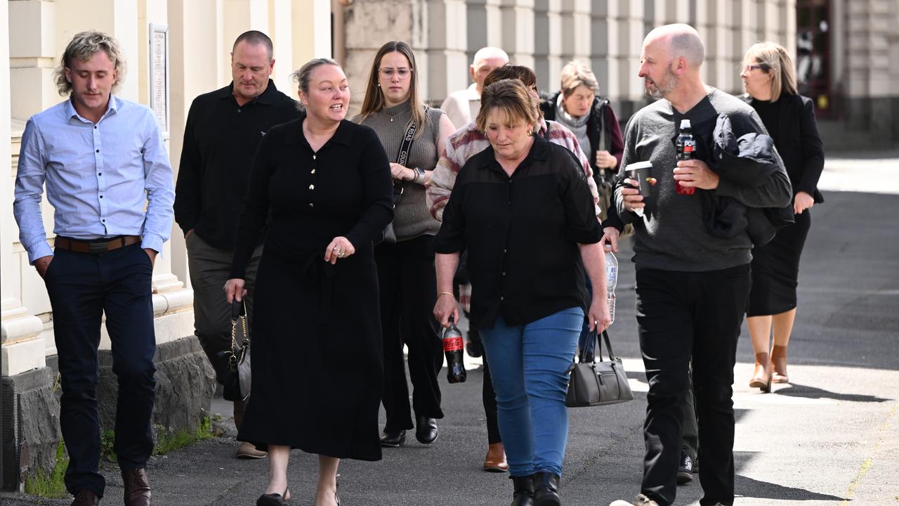 Hannah McGuire's mother Debbie (centre) with family and supporters