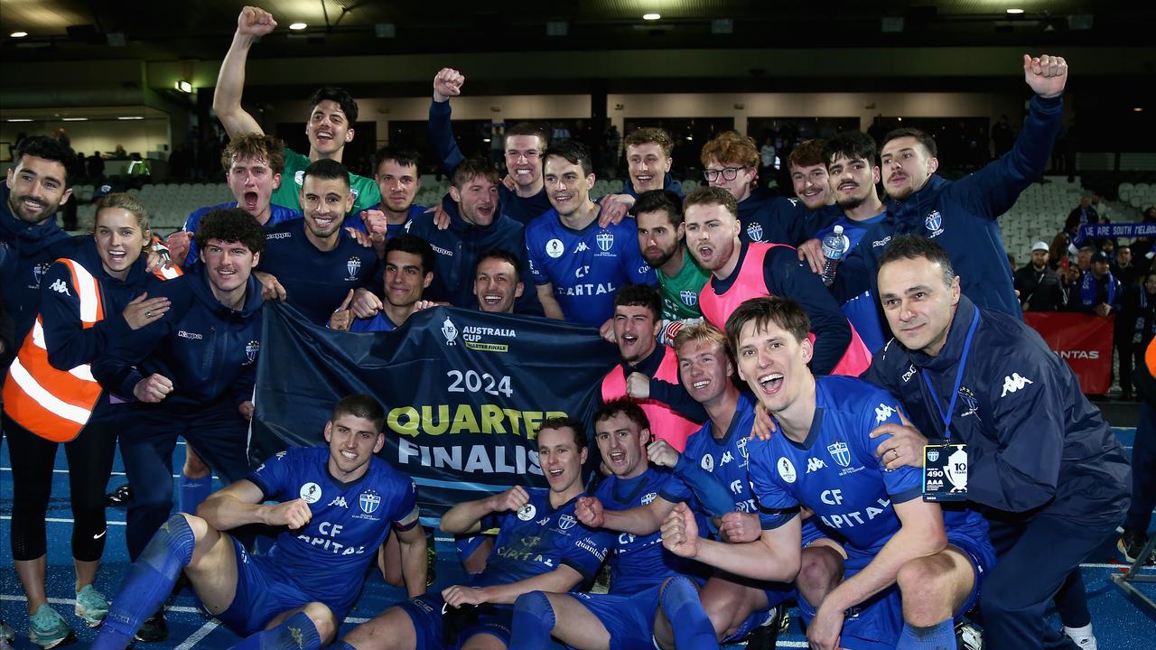 South Melbourne players celebrating.