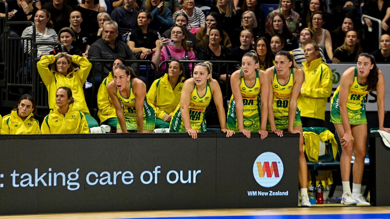 Diamonds players look on during t