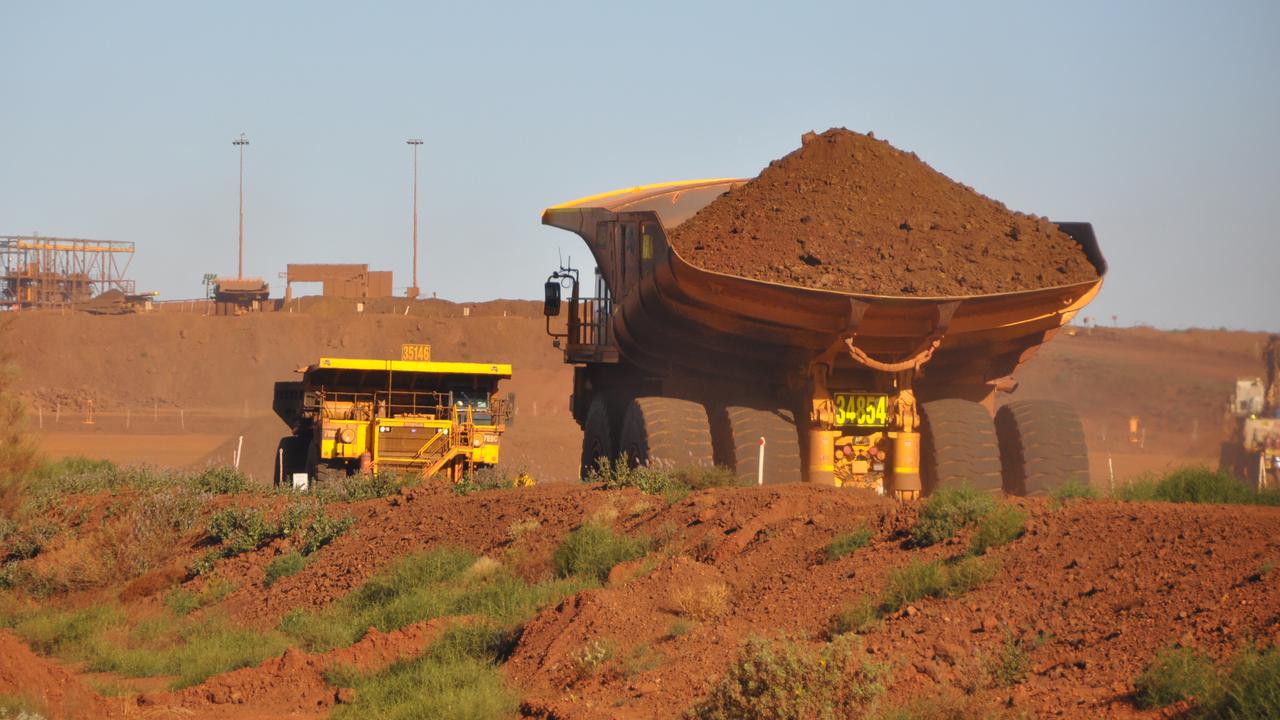 Trucks at a Fortescue iron ore mine (file image)