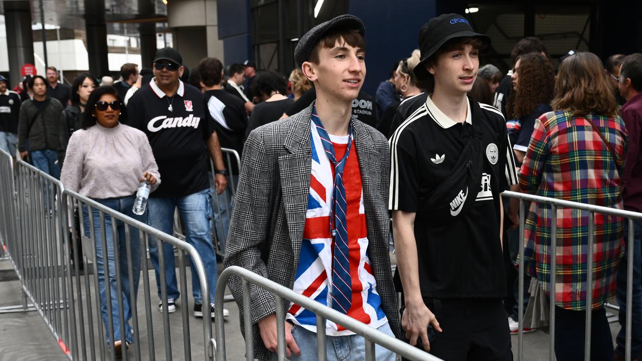 Guests wait for gates to open for the Oasis concert at Marvel Stadium