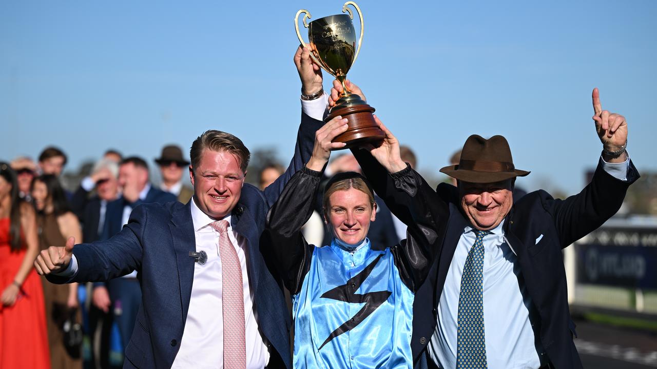 Jockey Jamie Melham and co-trainers Calvin and Tony McEvoy