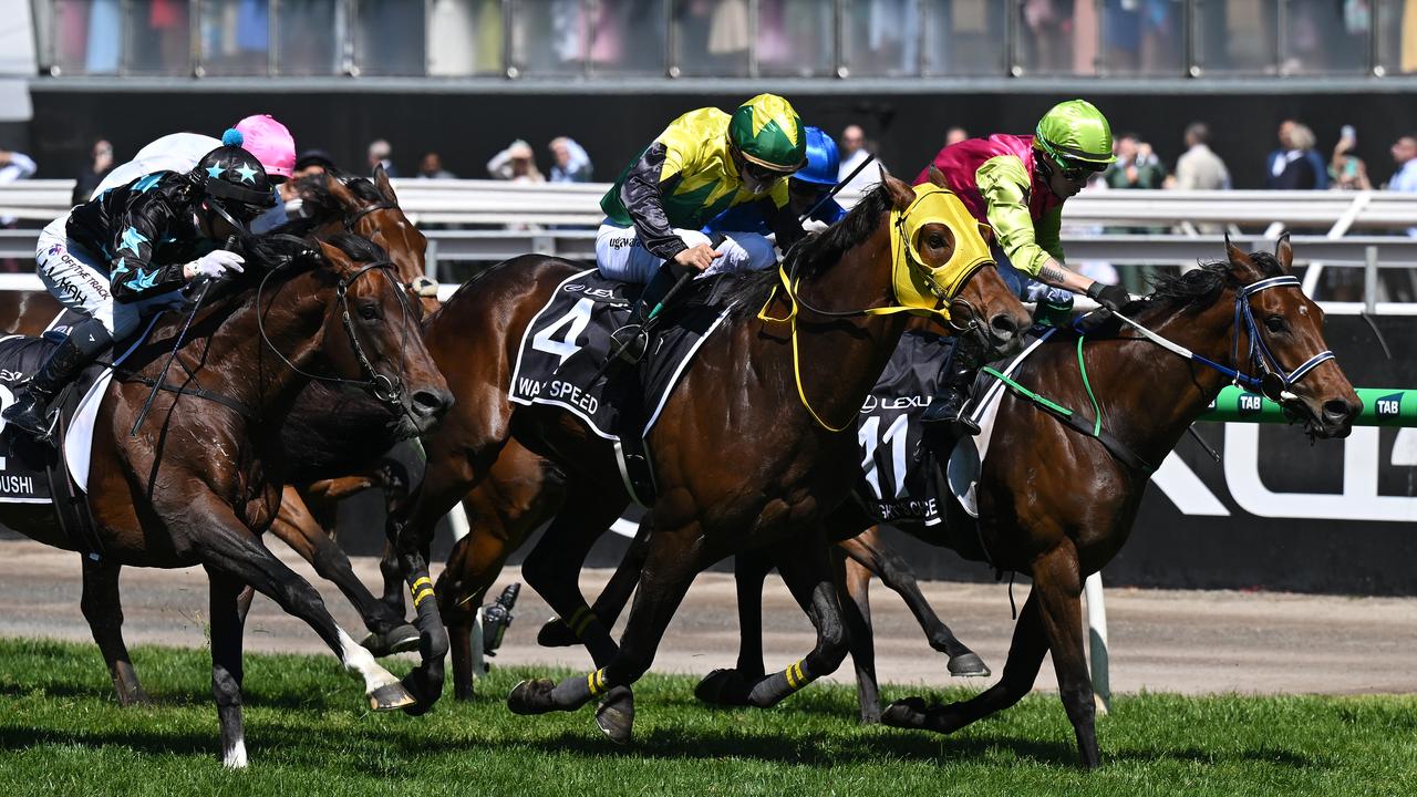 Knight's Choice (right), ridden by Robbie Dolan, wins Melbourne Cup