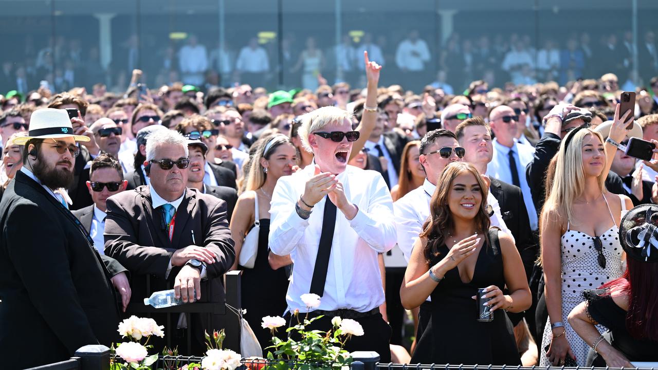 Racegoers react at Derby Day