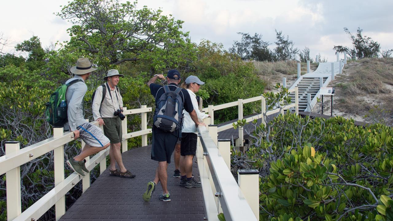 Hikers en route to Cook's Look, the tallest point of Lizard Island,
