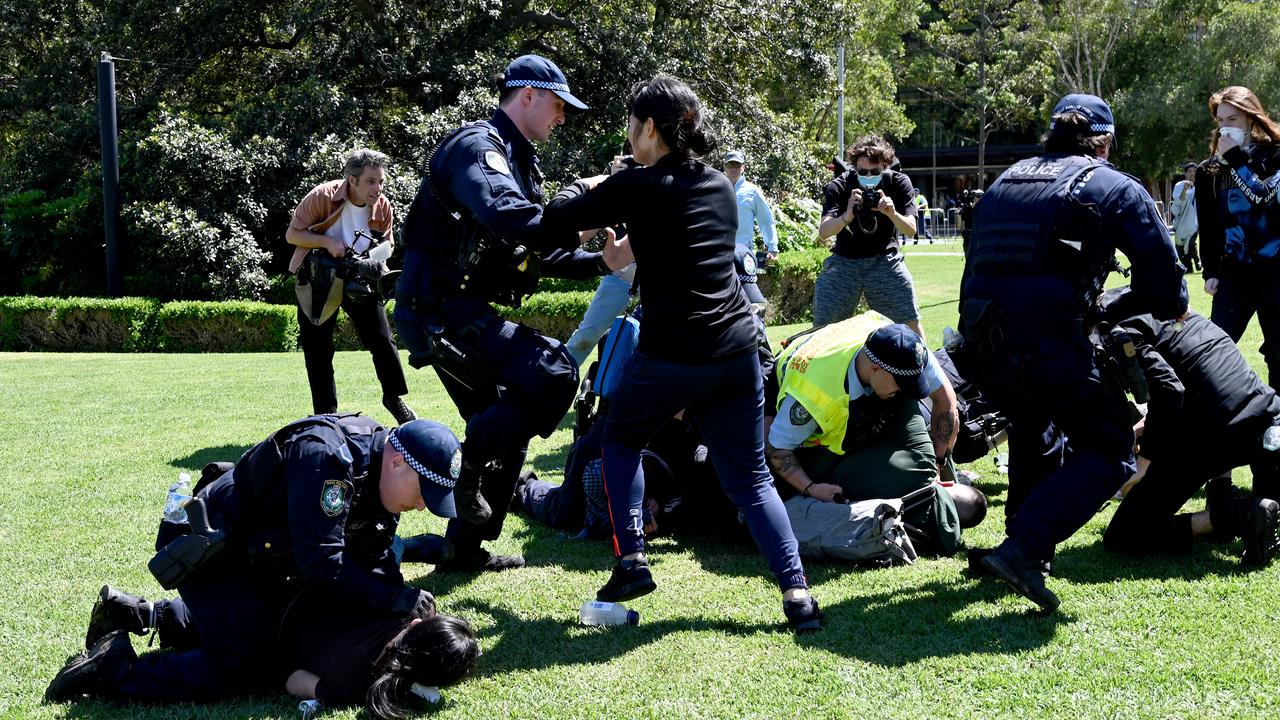 Police scuffled with protesters trying to blockade a weapons expo.