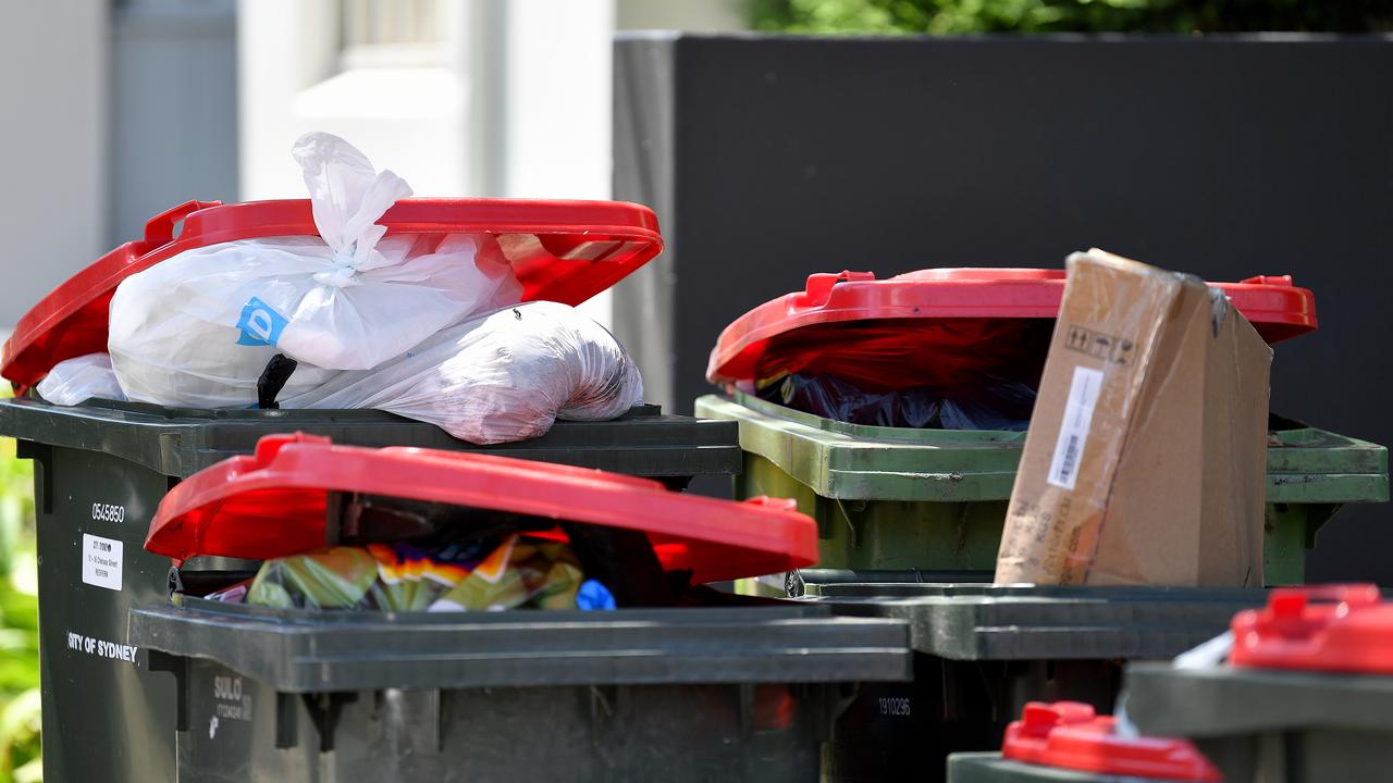 Overflowing household rubbish bins in Surry Hills, Sydney