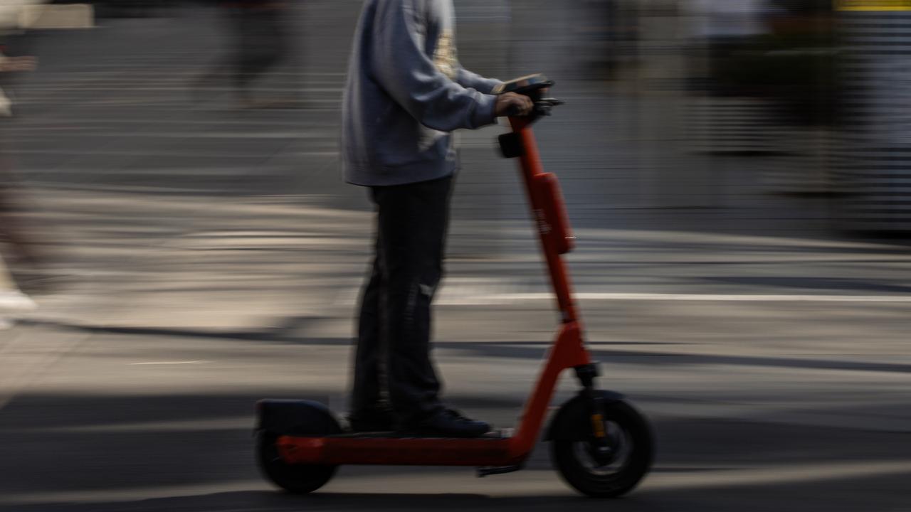 A person riding an electric scooter (file image)