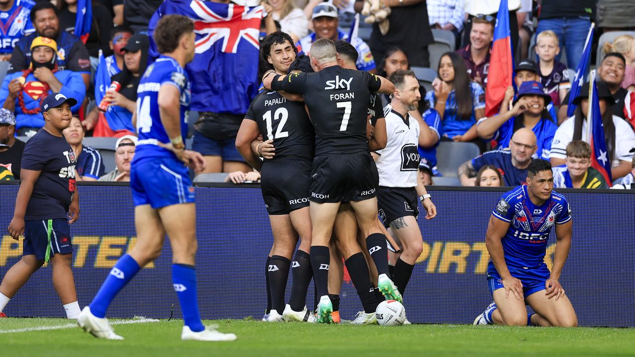 Celebrating New Zealand players.