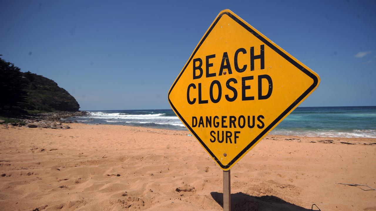 A sign warns swimmers to stay out of the water at Avalon Beach, Sydney