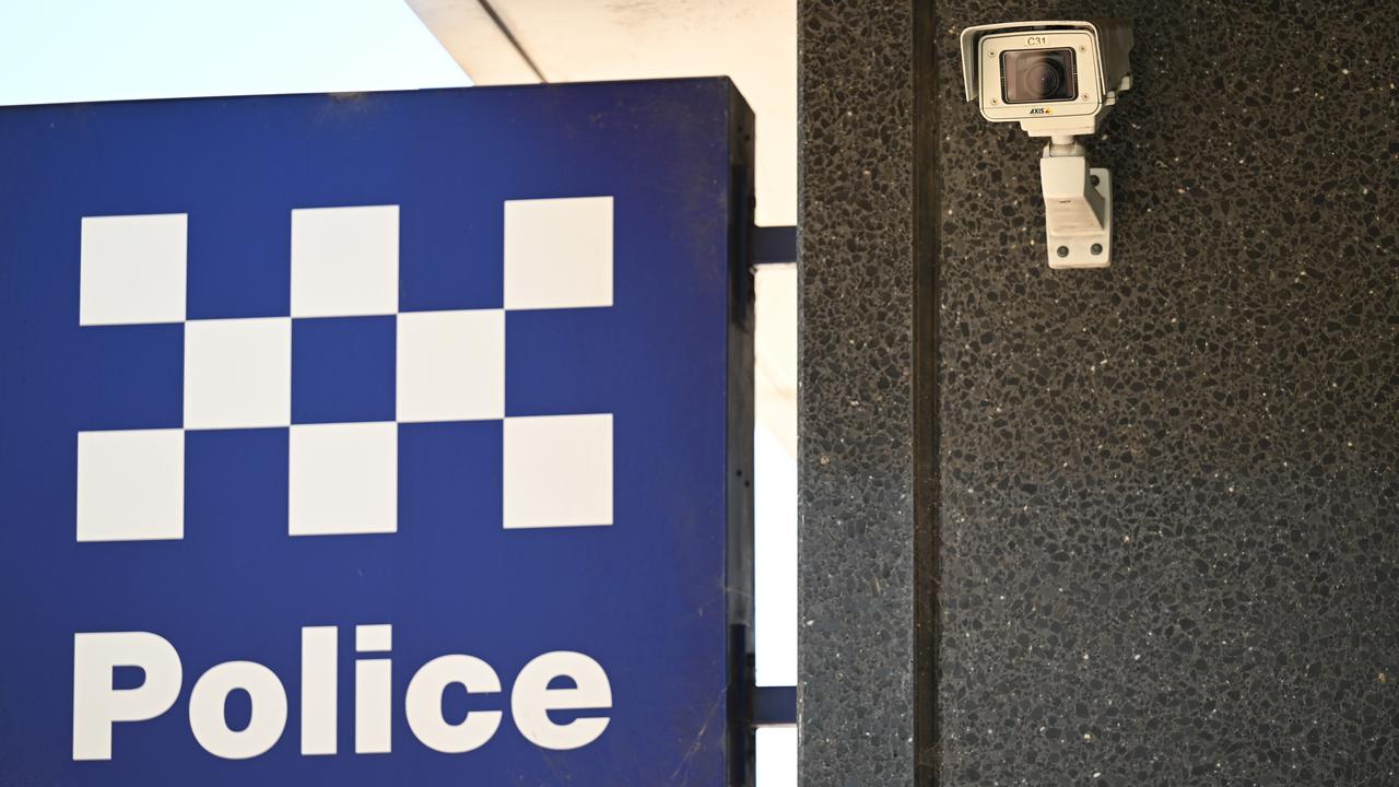 A NSW Police sign and security camera