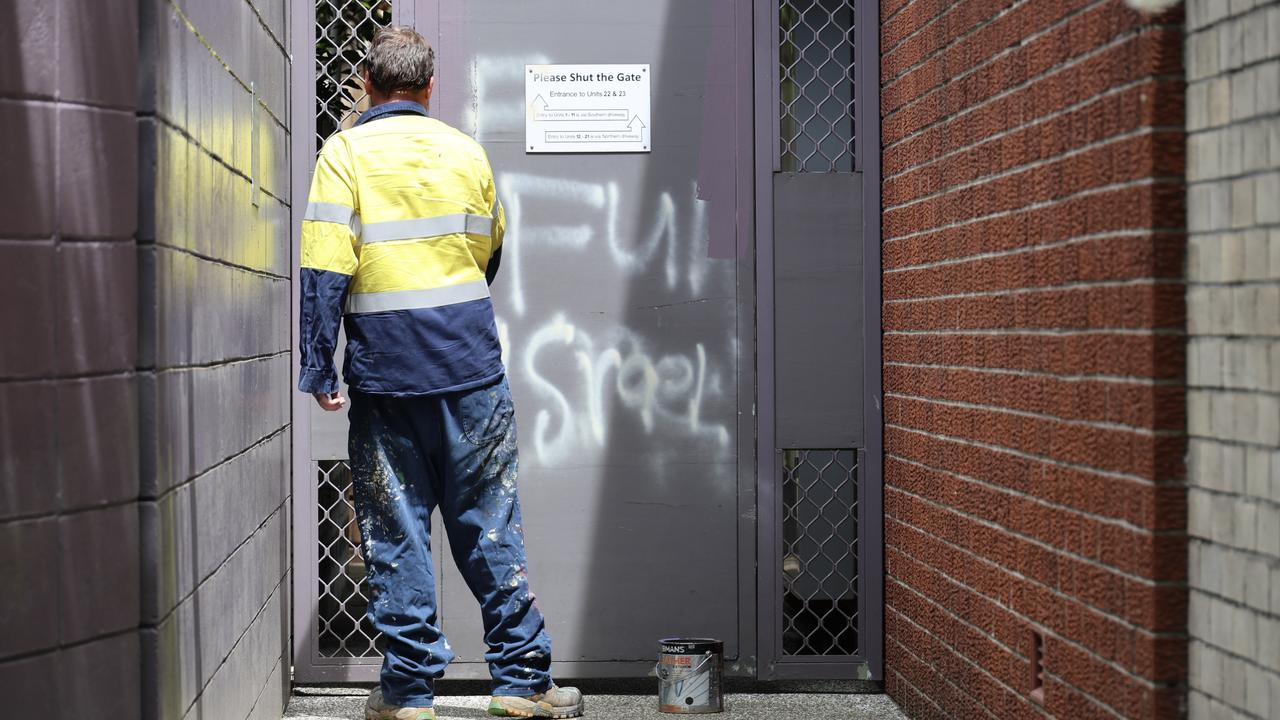 Graffiti is removed from a door in Woollahra (file)