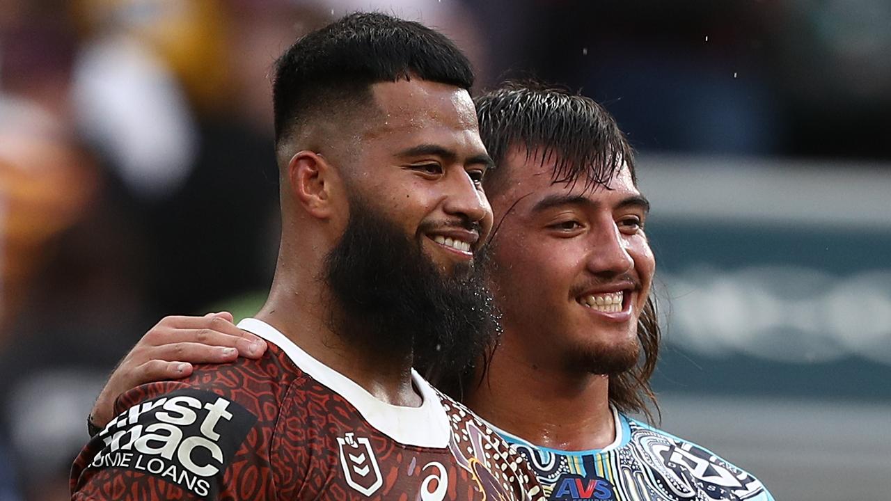 Payne Haas  of the Broncos and Klese Haas of the Titans (file)