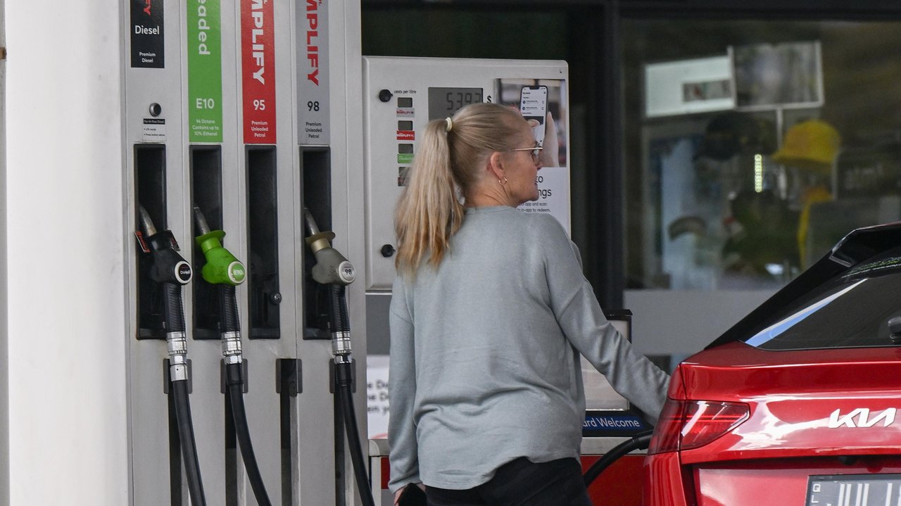 Motorist filling their car with fuel