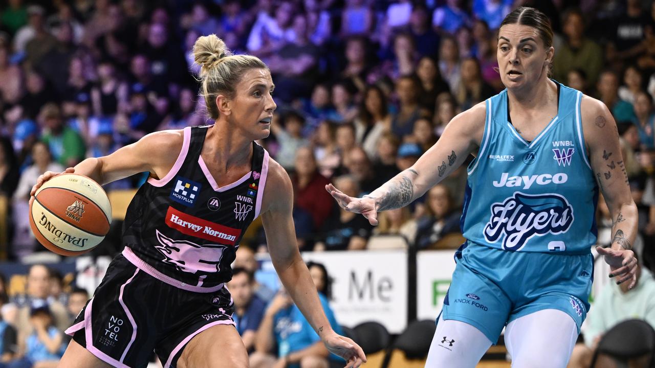 Lauren Nicholson of the Flames (left)